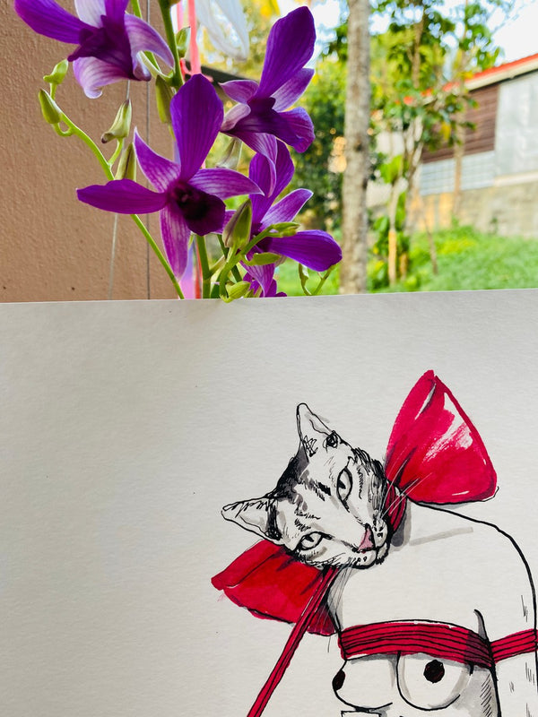 Cat with a red bow