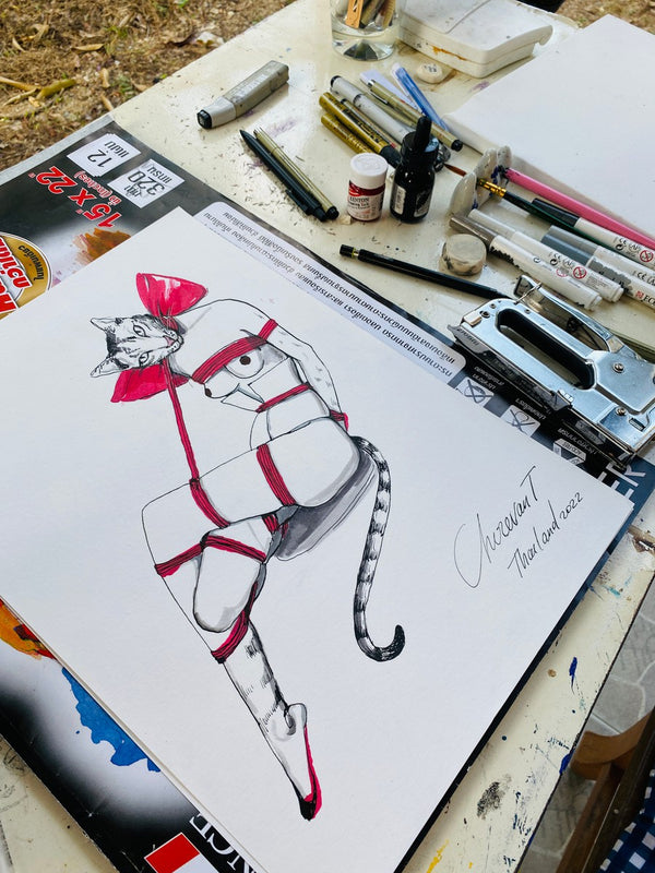 Cat with a red bow