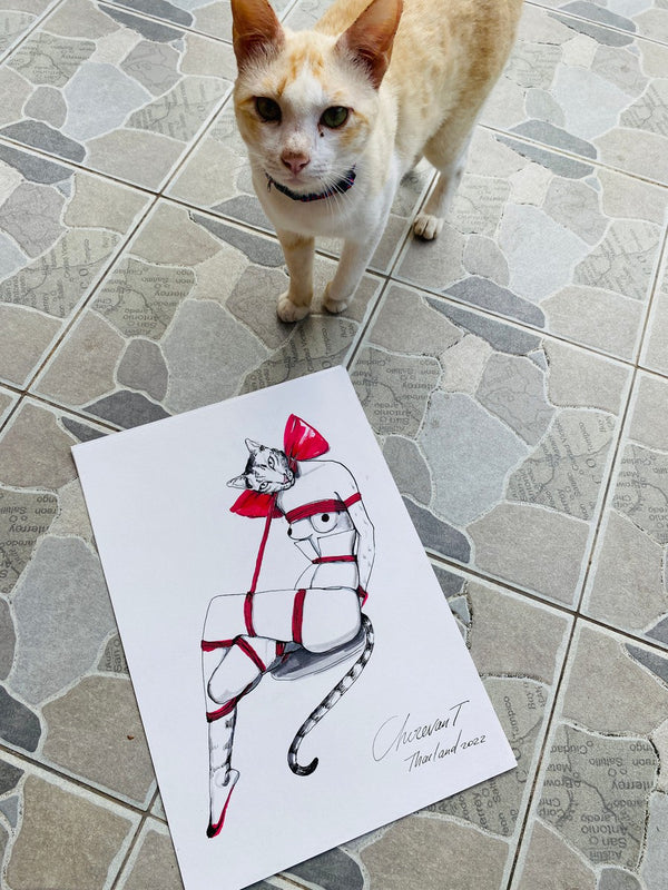 Cat with a red bow